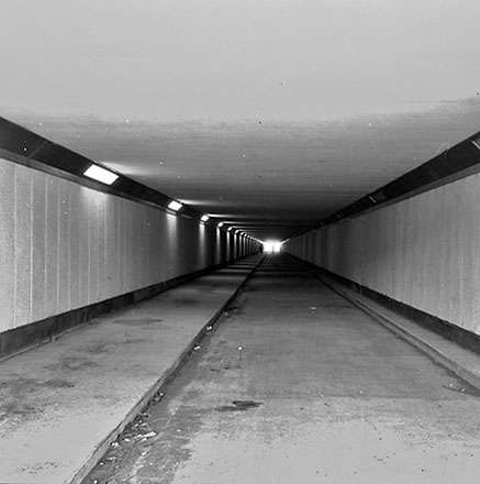 c. Interior and exterior views of a pedestrian subway that runs under the airport, from Rongotai to Miro Street and Broadway