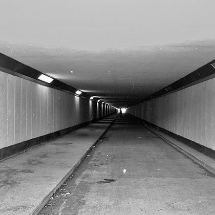 d. Interior and exterior views of a pedestrian subway that runs under the airport, from Rongotai to Miro Street and Broadway