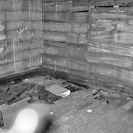 d. 9 Mein Street, a single-storey wooden building