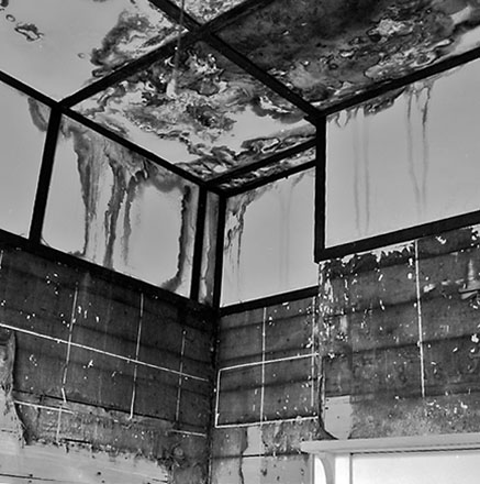 j. 9 Mein Street, a single-storey wooden building