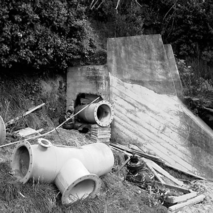 b. Workman welding pipes