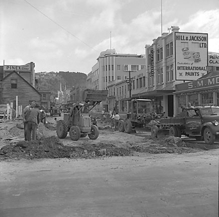 a. Workmen constructing drainage system