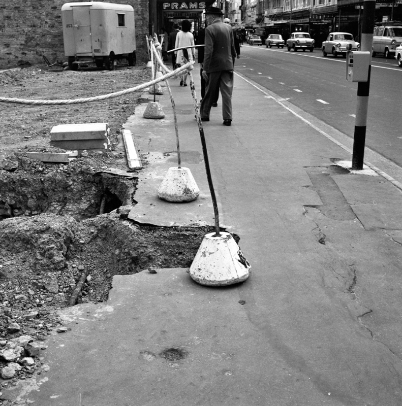 b. Hole in footpath, Willis-Willeston Sts