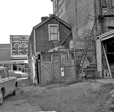 a. 4 Leeds Street, two-storey wooden and iron building.