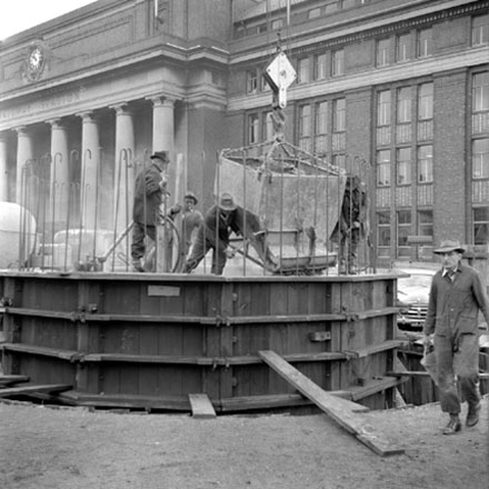 b. views of, workmen, machinery