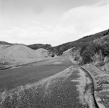 a. Sealed road, undeveloped land
