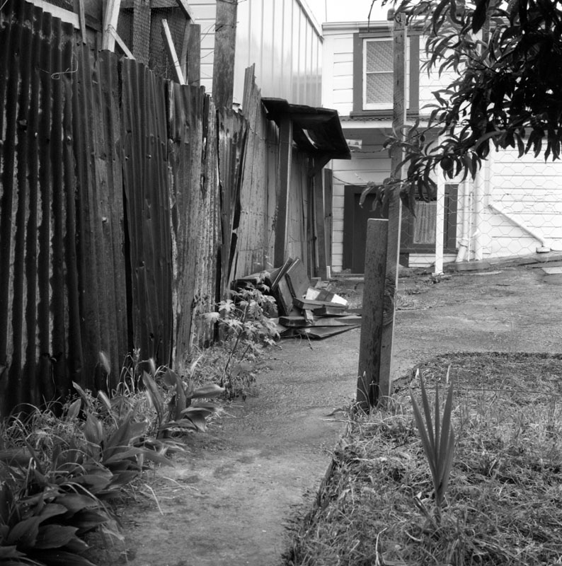 b. No 44 Owen St, Uneeda Fruit Co. large stacks of empty fruit boxes