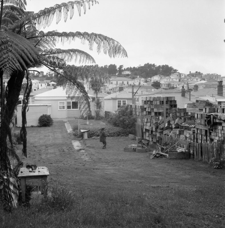d. No 44 Owen St, Uneeda Fruit Co. large stacks of empty fruit boxes