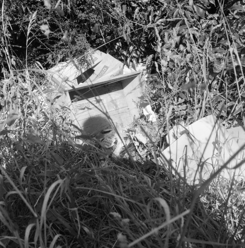 c. Rubbish dumped on side of Old Porirua Road