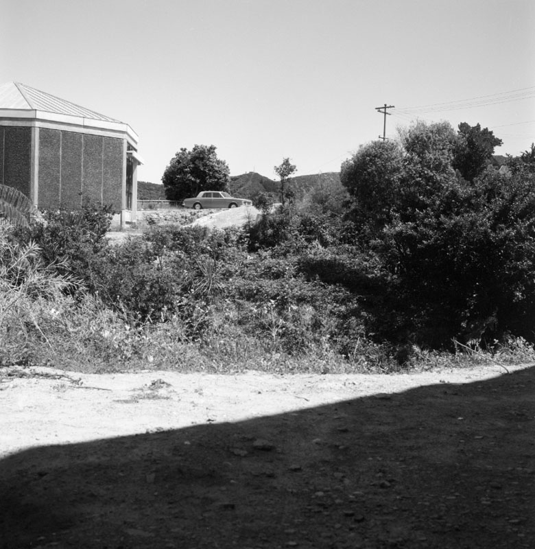 f. No 152 Barnard St. scouring of bank and rubble left by downpour