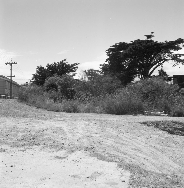 i. No 152 Barnard St. scouring of bank and rubble left by downpour