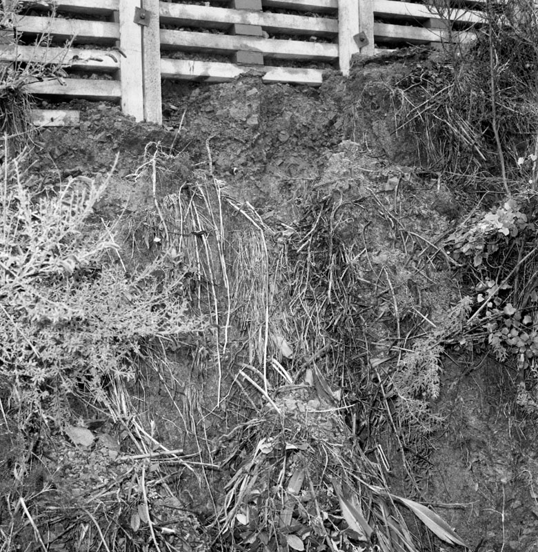 k. No 152 Barnard St. scouring of bank and rubble left by downpour