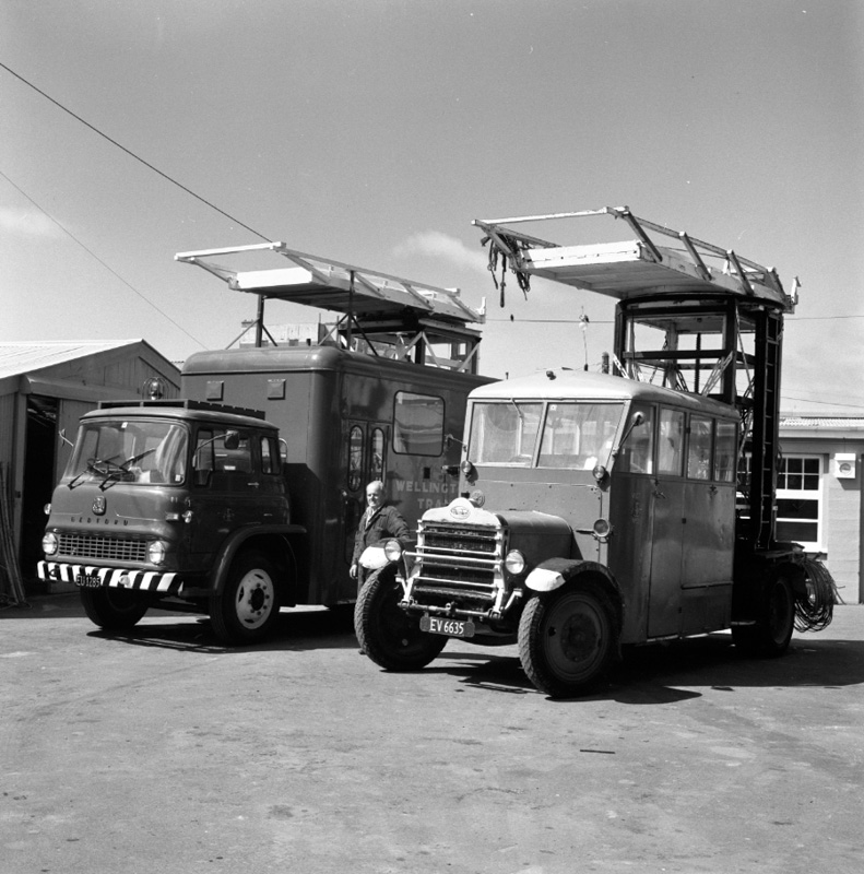 c. Daimler overhead repair truck no. 15 and Bedford overhead repair truck no. 11