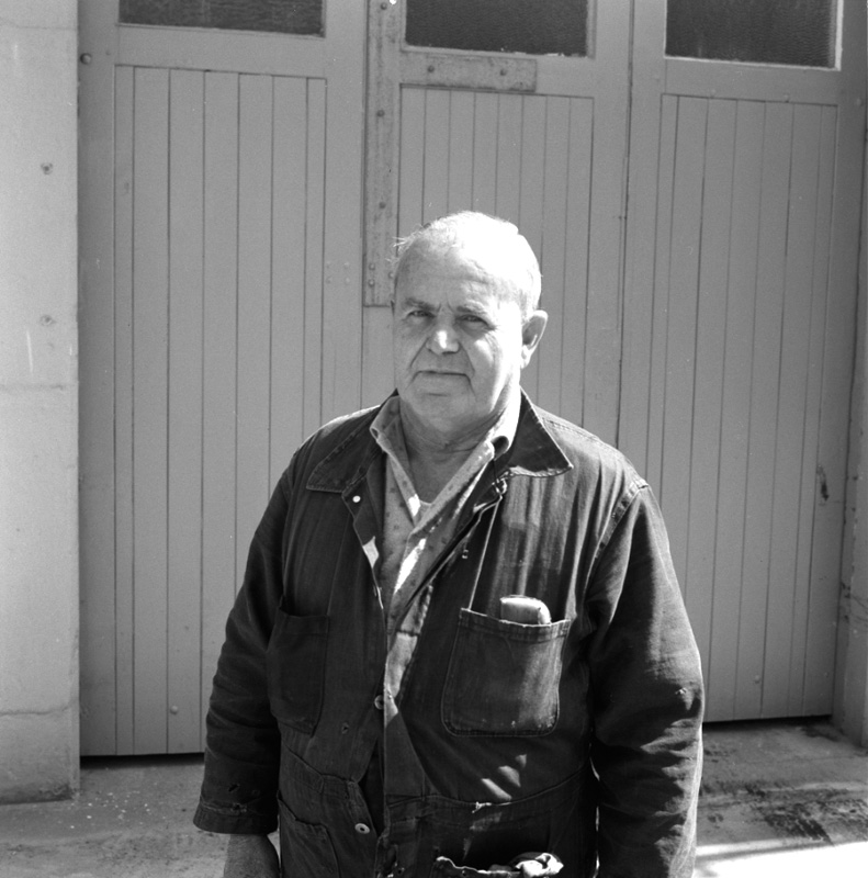 g. Staff member, Overhead trolley system - transport dept