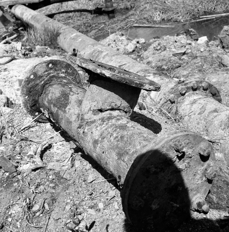 b. Gear Island, corroded water pipes, Wainui catchment