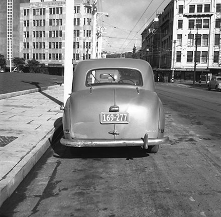 b. Damaged motor vehicle parked in Cuba Street, Car No. 169-277