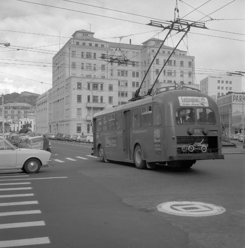 b. Buses with MO Building in background
