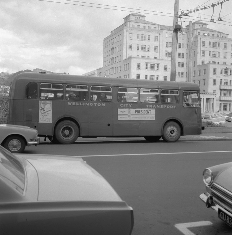 f. Buses with MO Building in background