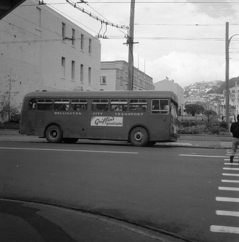 i. Buses with MO Building in background