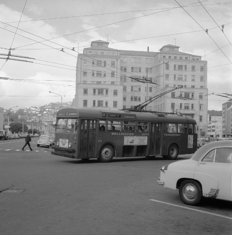 j. Buses with MO Building in background