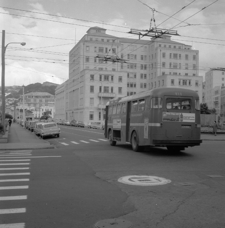 k. Buses with MO Building in background