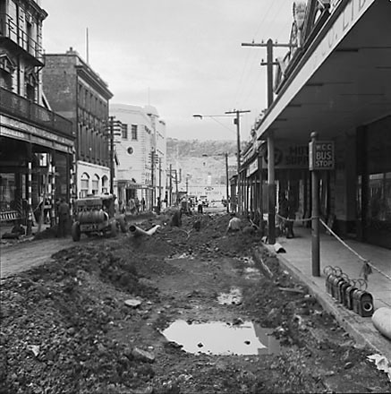 a. Roadworks, workmen, trucks, excavating machinery, commercial buildings