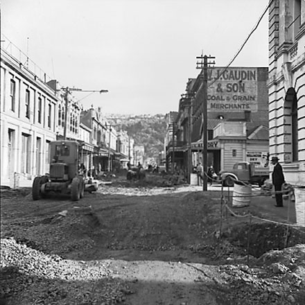 b. Roadworks, workmen, trucks, excavating machinery, commercial buildings