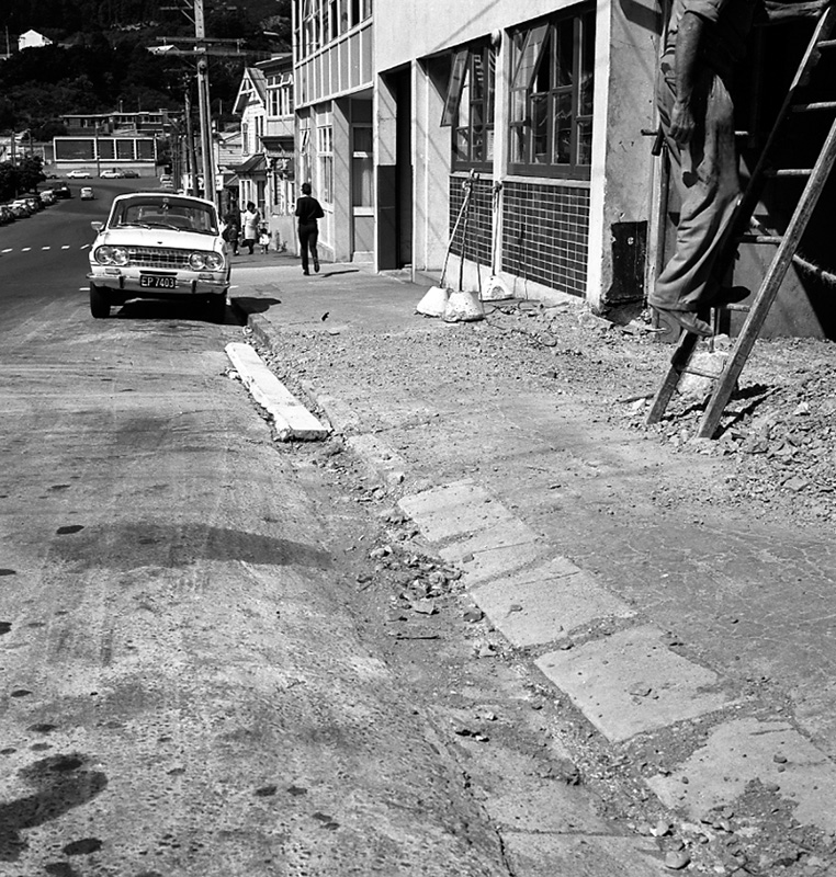 b. Footpath, Rugby St, Post office stores