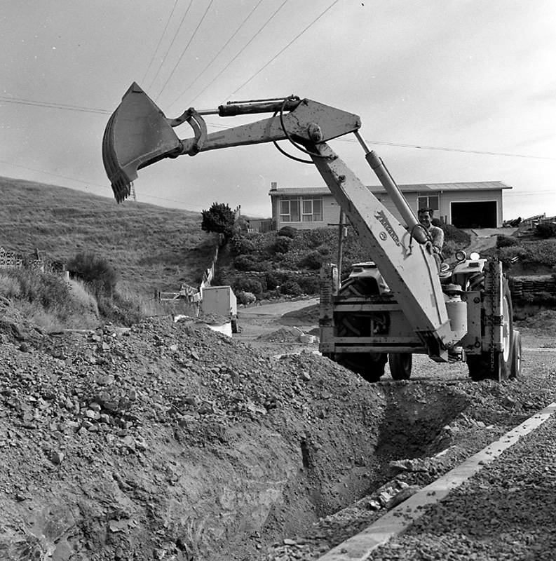 d. Tracgrip trench digger