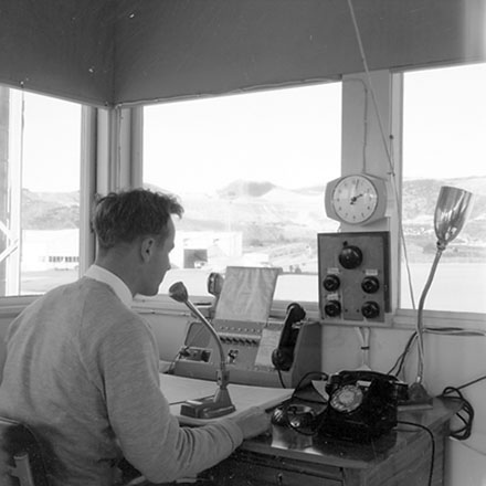 i. Man working inside Control Tower