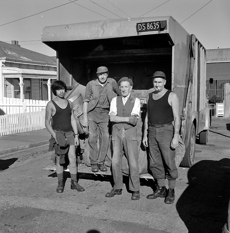 b. House refuse group on truck