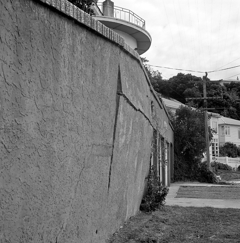 d. No 412 Evans Bay Road, cracked wall facing footpath