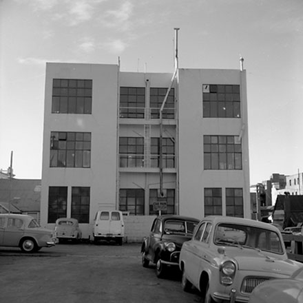 j. 13-15 Garrett Street, three storey concrete commercial building, back of Morrisons' Building