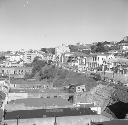 o. The Terrace, elevated view of dwellings, apartment building and a Masonic lodge. Also backs of buildings on Lambton Quay, including the Gresham Hotel