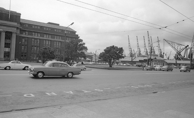 b. Front of railway station from roof of Waterloo Hotel and ground level