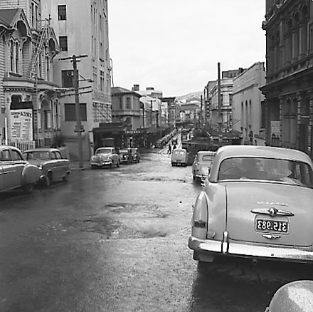 b. Willis Street and Manners Street intersection from Boulcott Street, motor vehicles, YWCA building on right next to Hotel Saint George