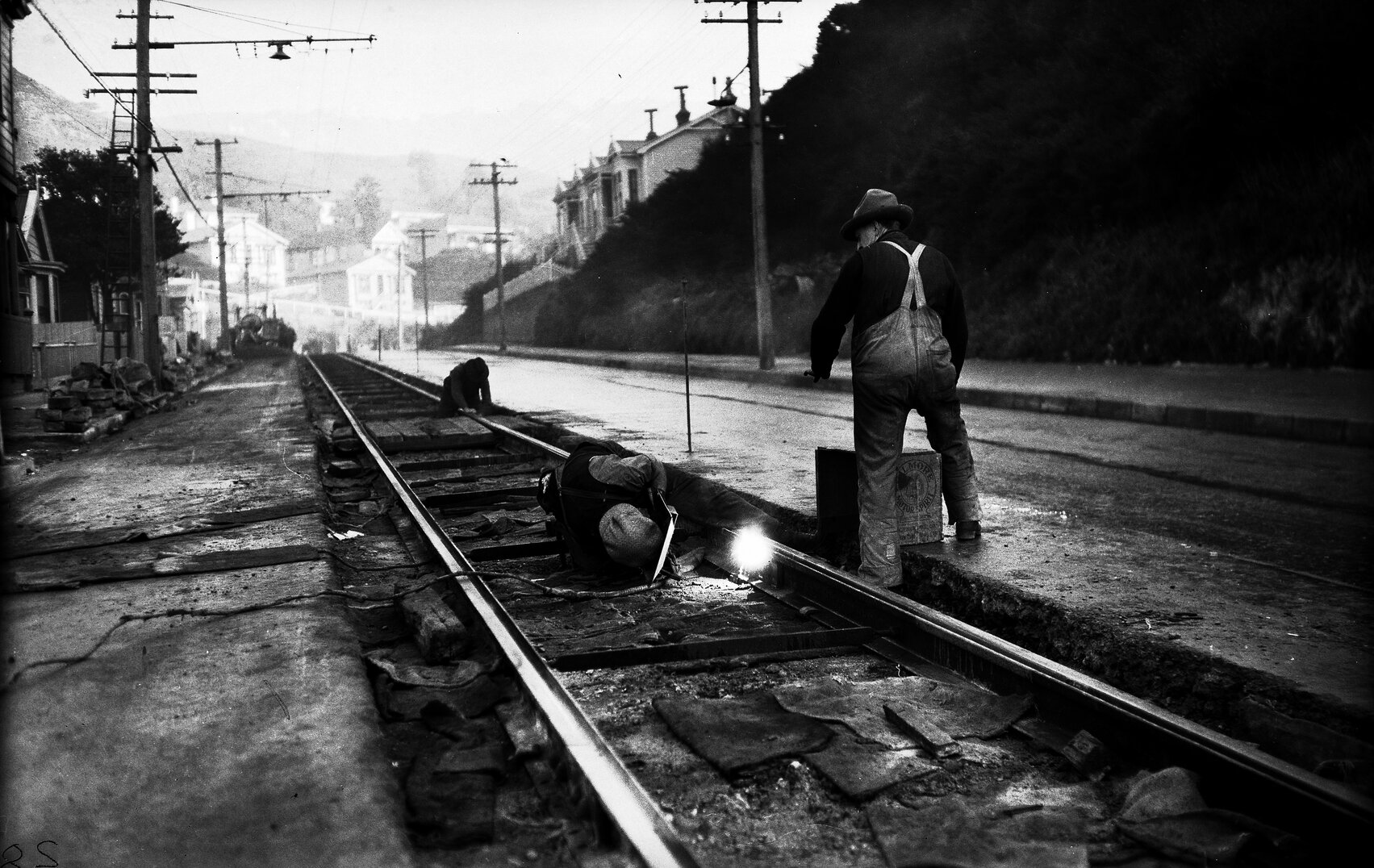 Aro Street, spot welding fishplates on newly laid tram rails