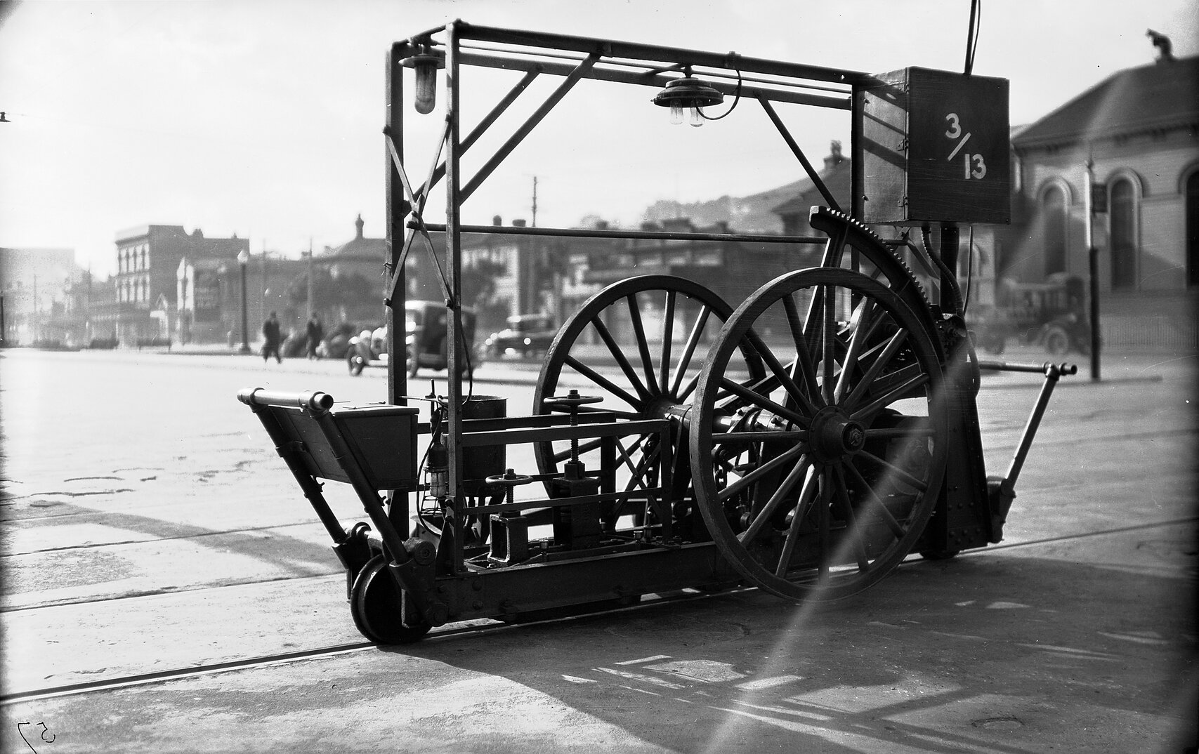 Cambridge Terrace and Vivian Street, workmen with a Reciprocating Grinder