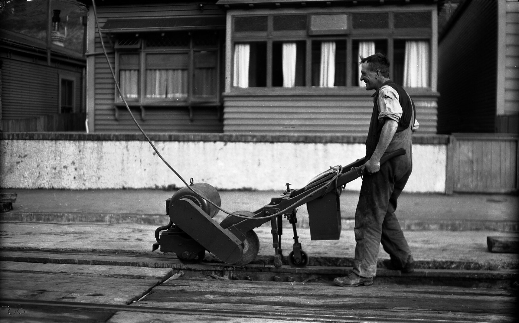 Aro Street, workman with Celerity Grinder