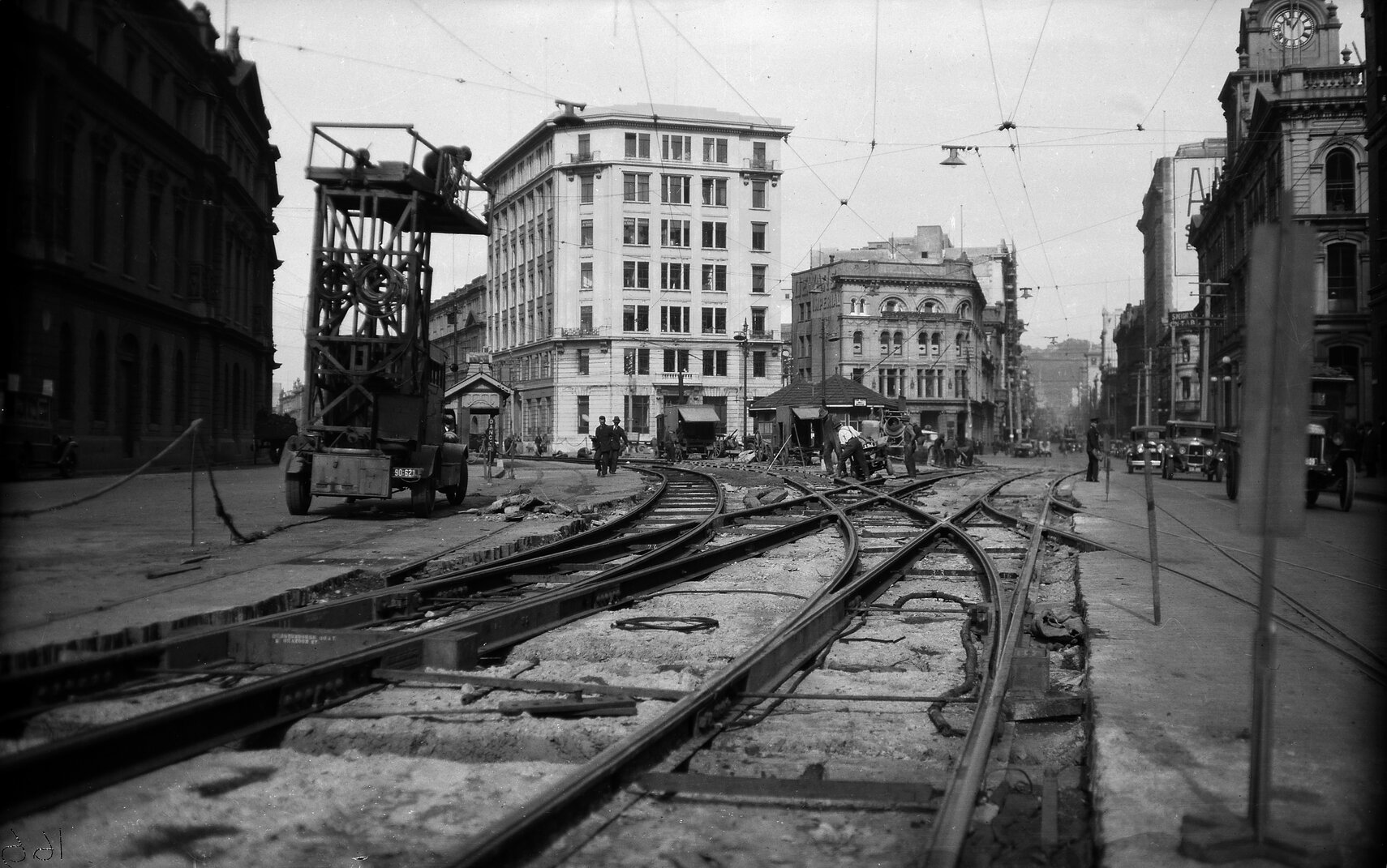 Customhouse Quay, workmen working on tram tracks, Wagon Tower to left of tracks