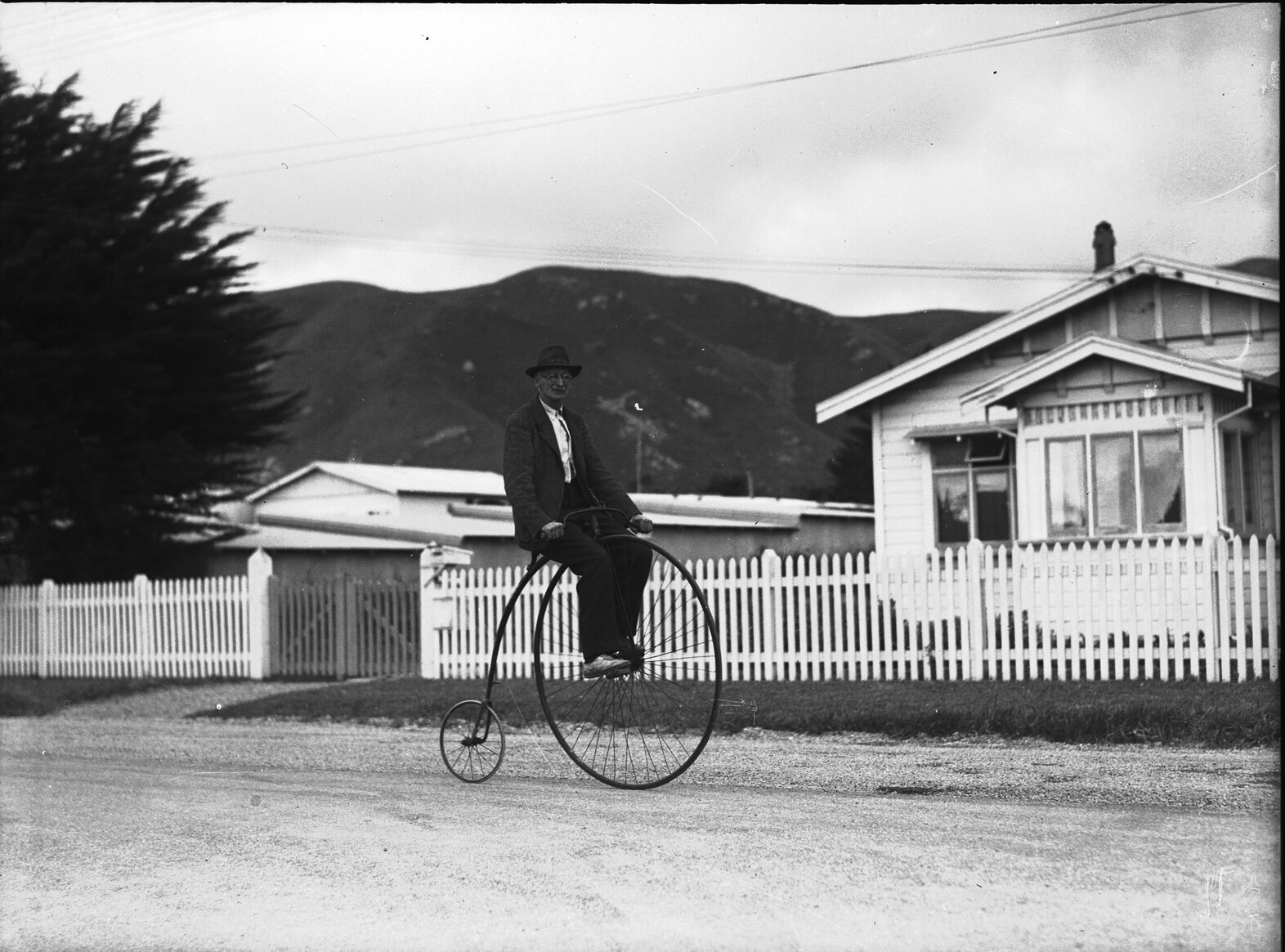 Man riding Penny Farthing bicycle