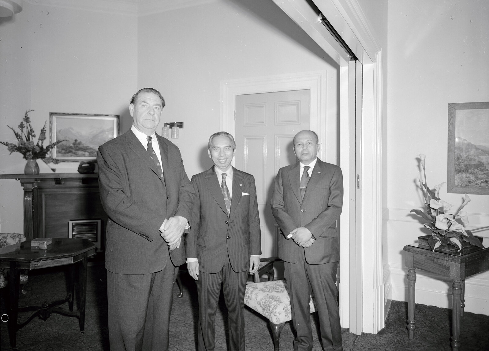 Mayor Frank Kitts with an Indonesian ambassador and one other. Mayoral Reception Room.