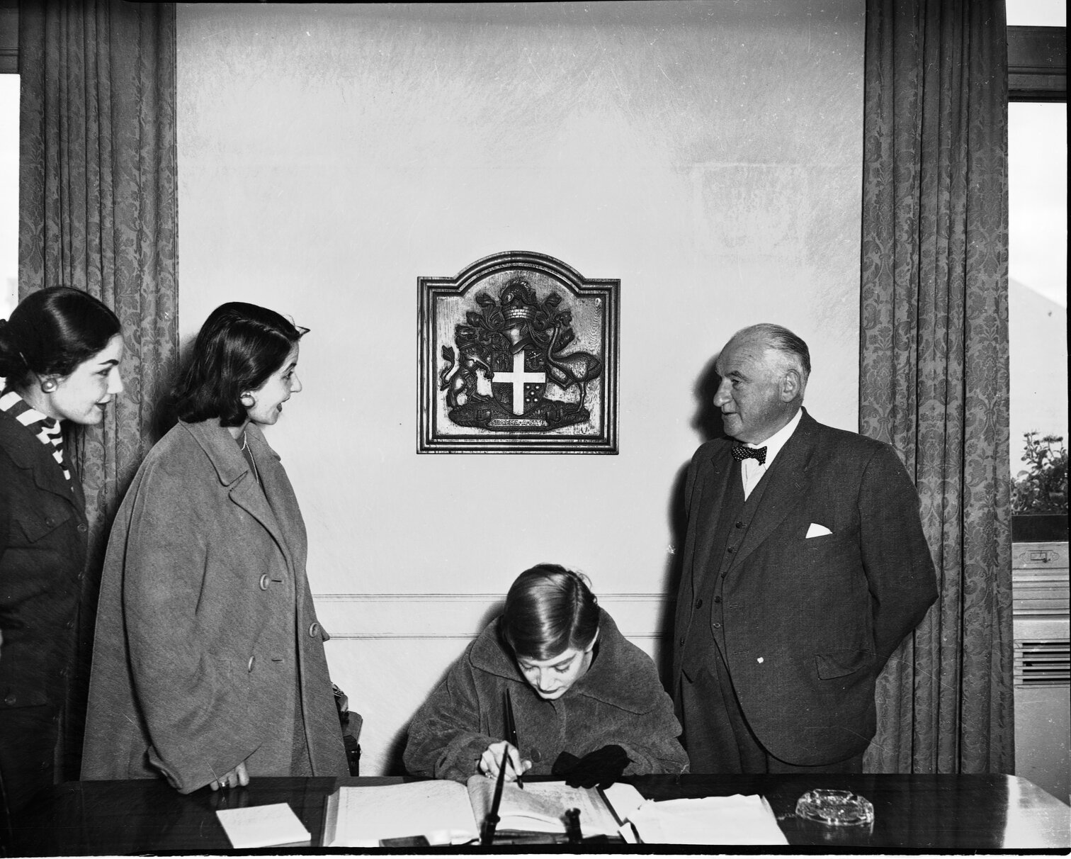 Mayor Macalister with Italian models. Mayoral Reception Room.