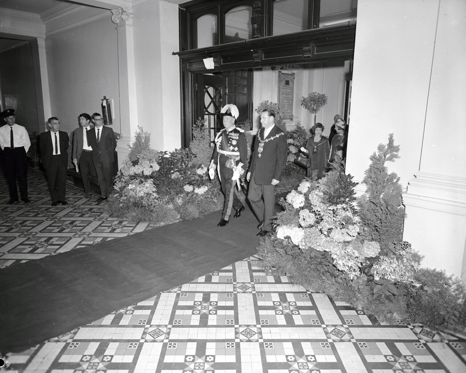 Sir Arthur &amp; Lady Porritt (Governor General), Reception. Sir Arthur Porritt entering the Town Hall with Mayor Kitts
