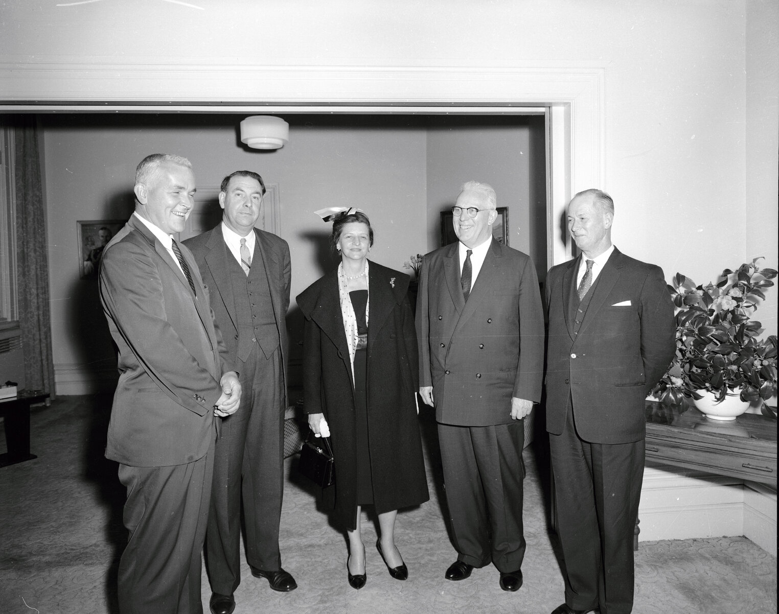 Hon Earl Warren, Chief Justice (USA) with Ms Bacon, US Charge d'Affaires (center)