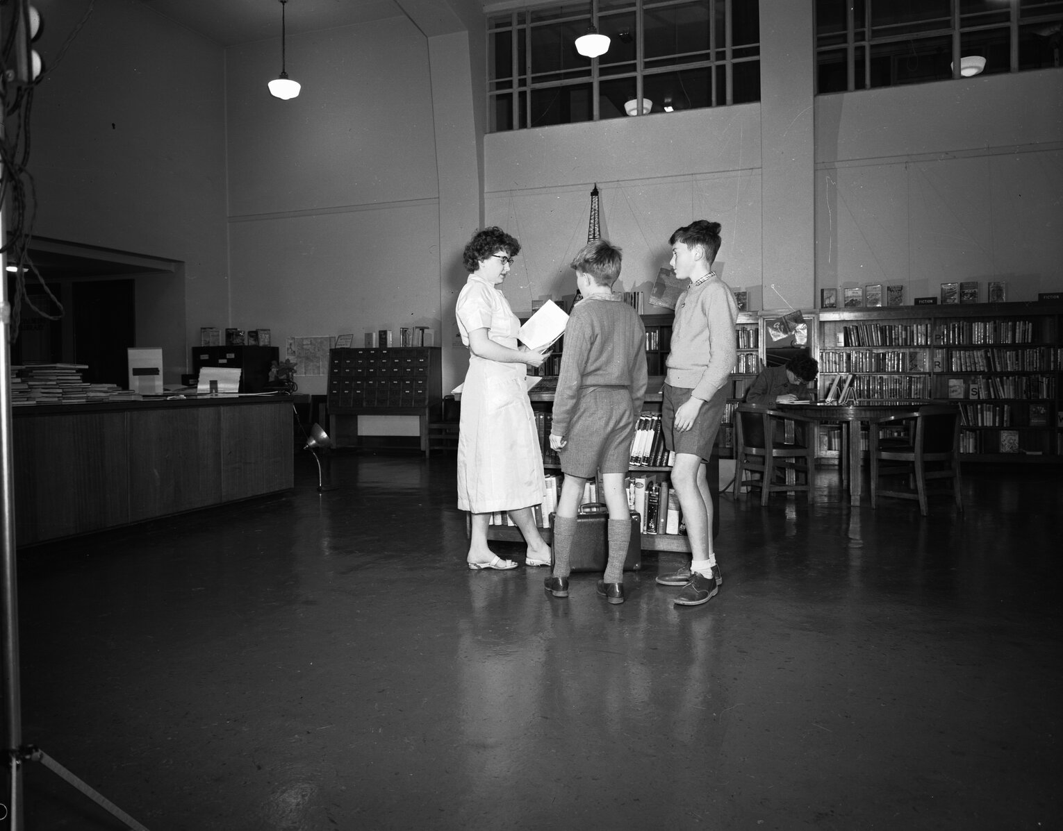Wellington Central Public Library: Ms Immerson assists juniors in Junior Room