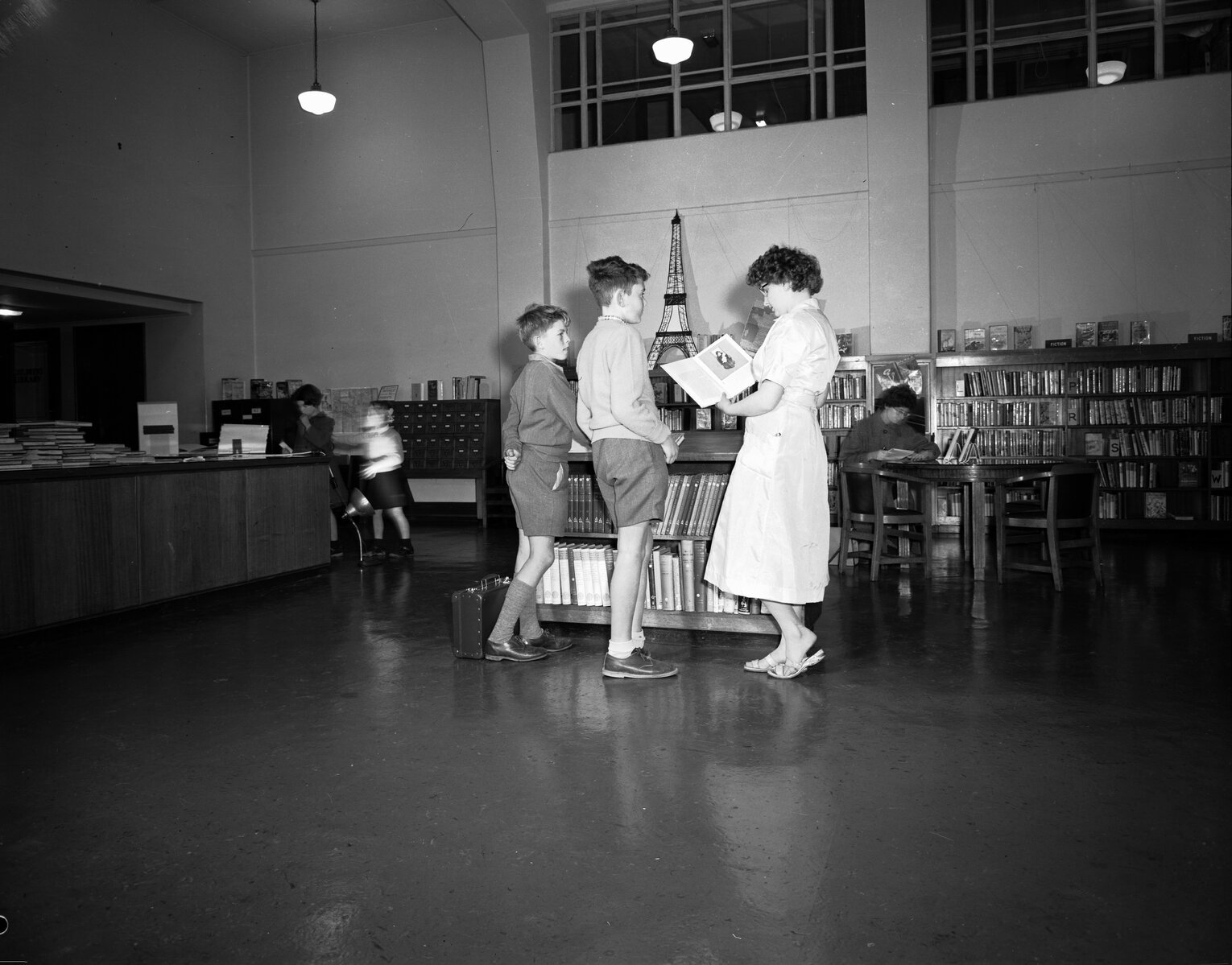 Wellington Central Public Library: Ms Immerson assists juniors in Junior Room