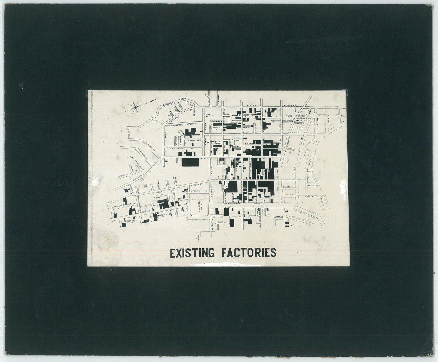 Photograph of a map of Mount Cook/Te Aro, existing factories