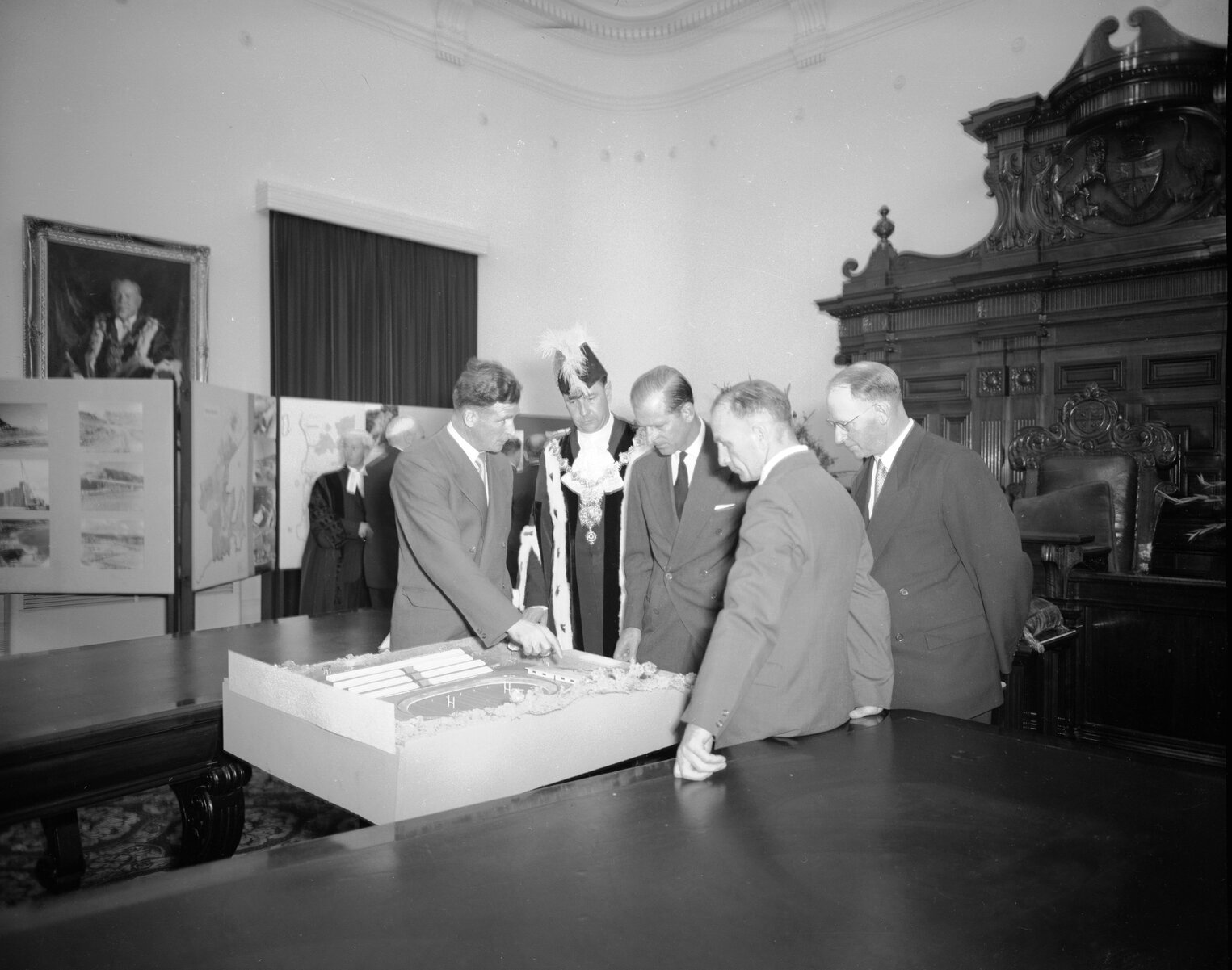His Royal Highness Prince Philip / Duke of Edinburgh viewing a council display with Councillors and Department Heads, Mayor Frank Kitts