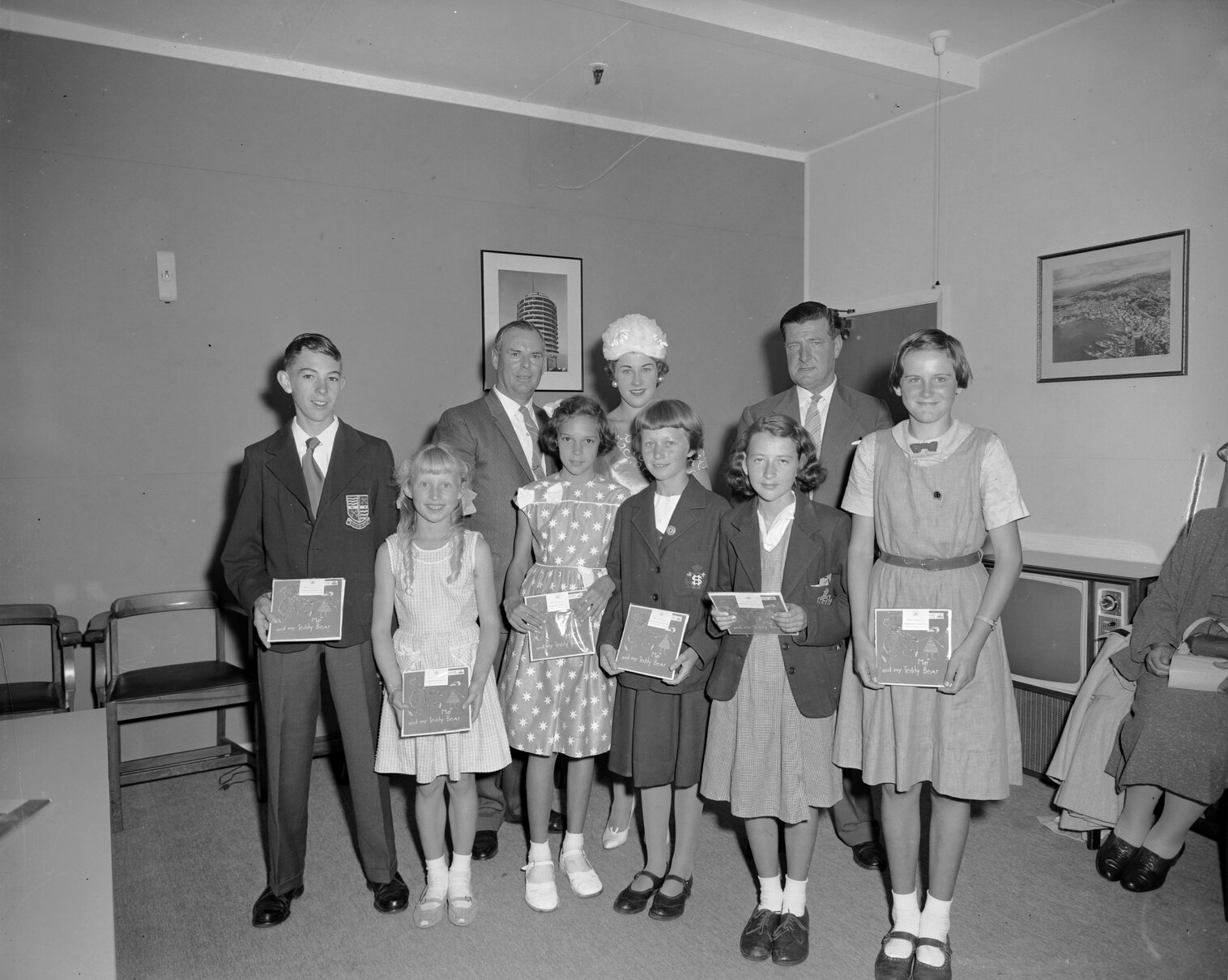 Festival of Wellington Traffic Slogan Competition winners, receiving gramaphone records as prizes from the H M V Co.